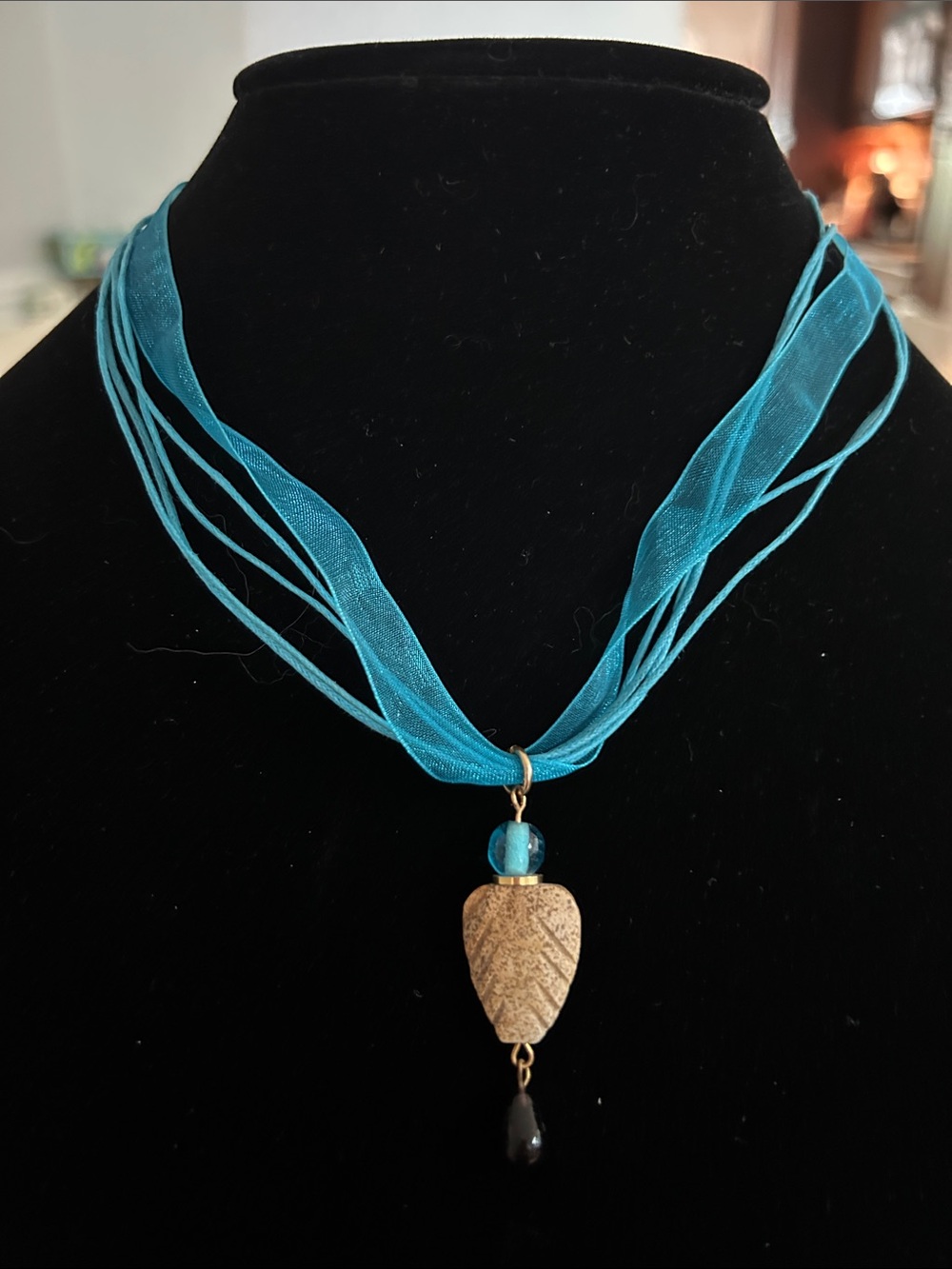 Turquoise Multi-Strand Ribbon Necklace with Carved Stone Pendant